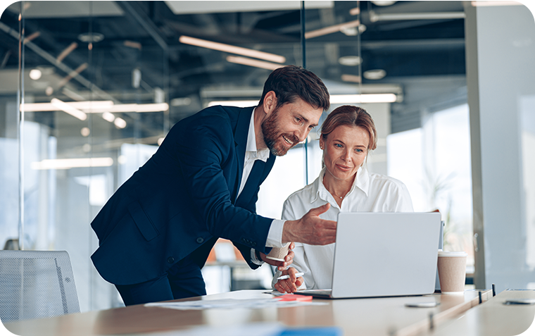 Female discussing project with male colleague